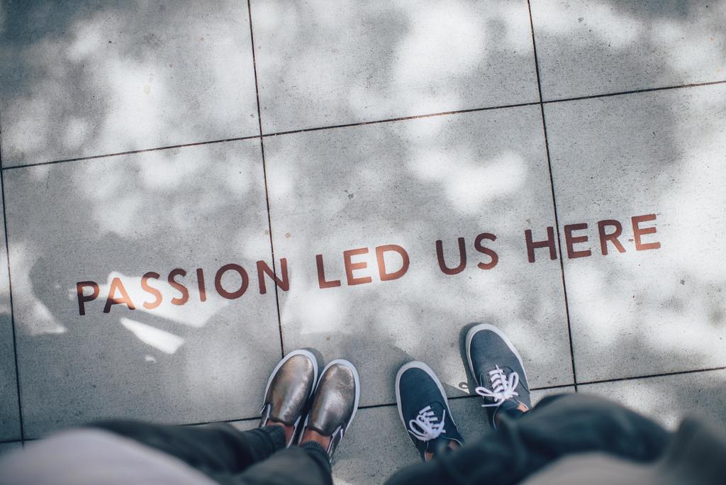 Picture of feet and "Passion Led us Here" quote
